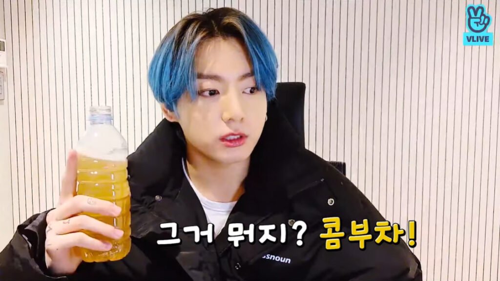 Jungkook drinking kombucha